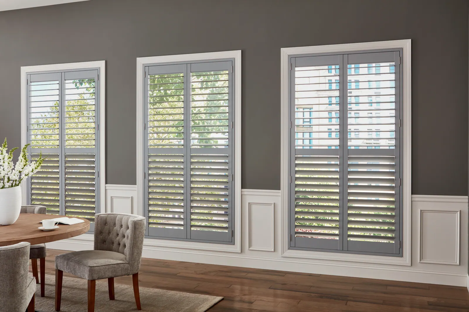 White plantation shutters with soft-close hinges in a Kailua-Kona dining room