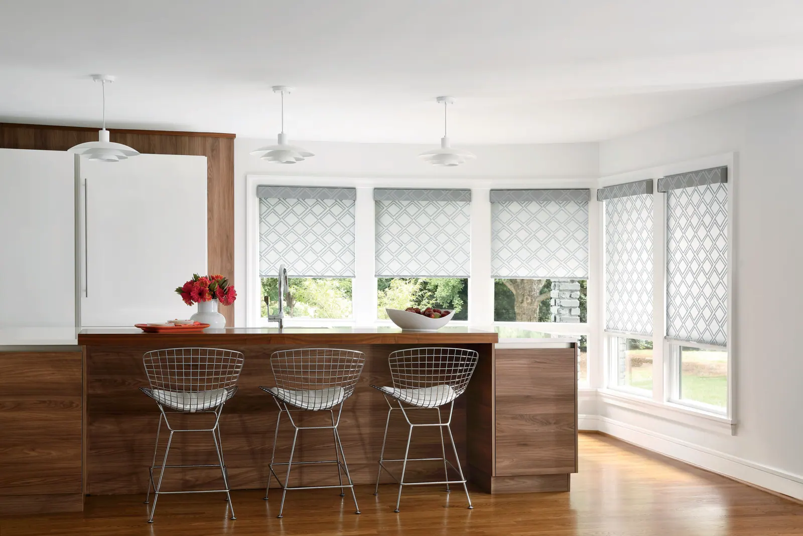 Roller shades over a kitchen window in a Big Island home
